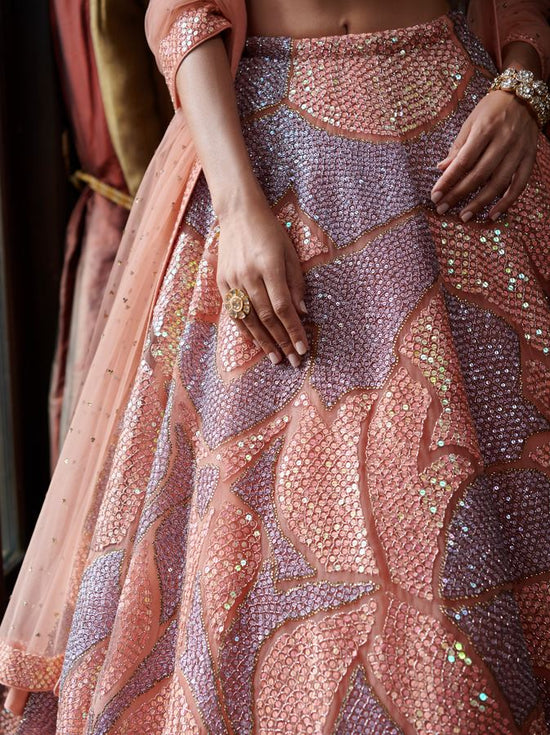 Jade - coral and purple lehenga set.