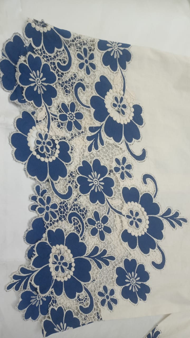 White Embroidered V-Neck Women’s Top with Floral Hem