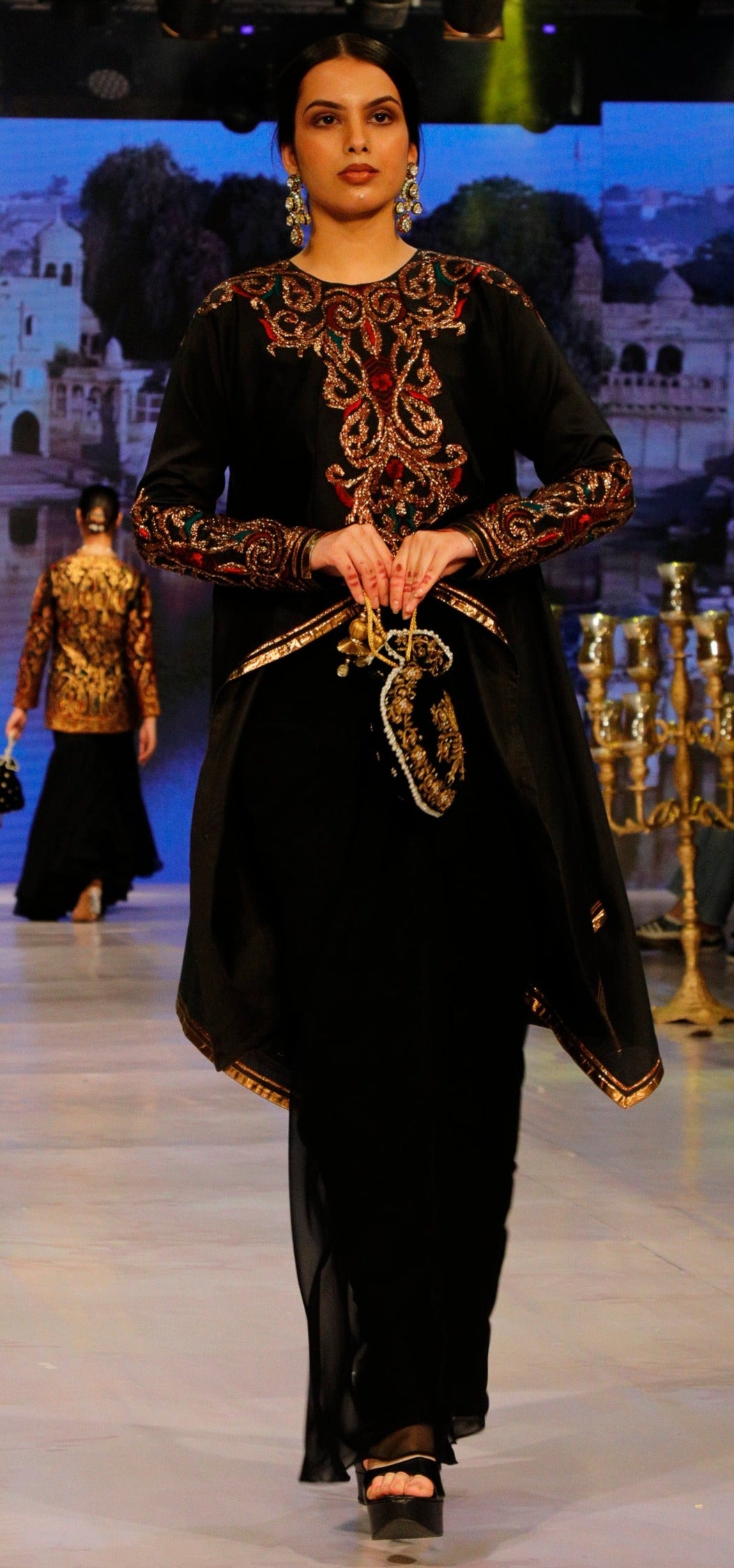 Black Suit with Gold and Maroon Gota work.