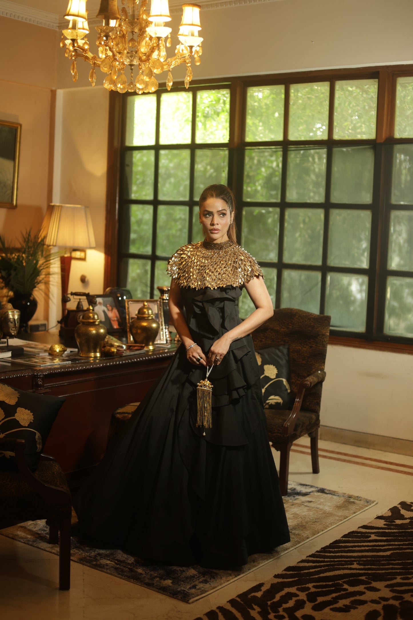 Black Couture Gown with Hand-Embellished Gold Cape