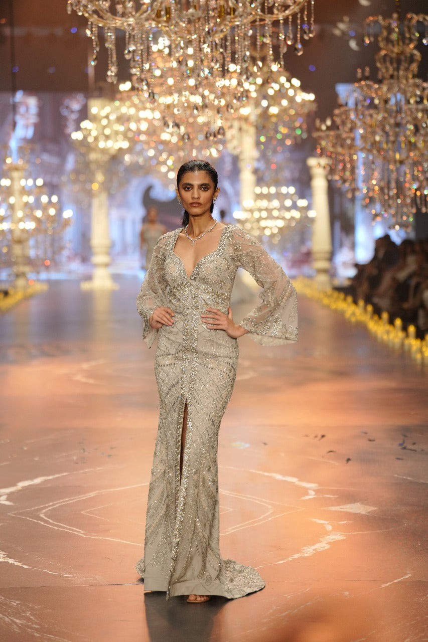Luxury Embellished Silver Evening Gown with Sheer Sleeves & Front Slit