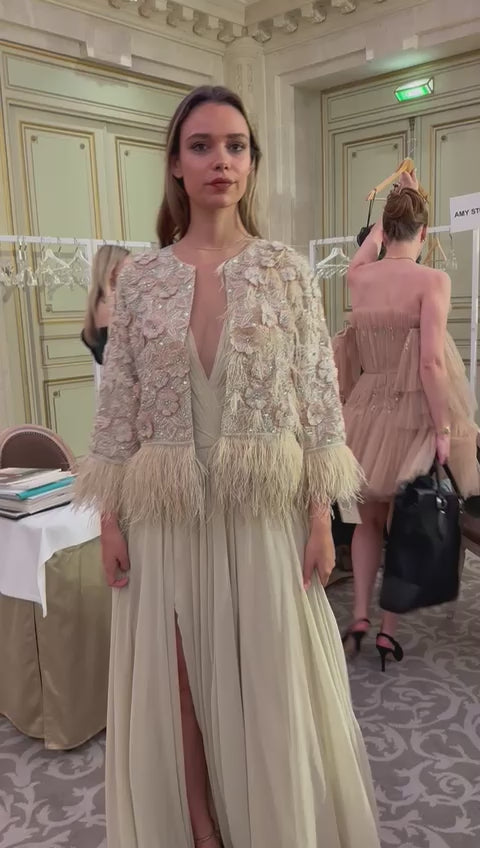 Load and play video in Gallery viewer, Elegant Beige Gown with Feathered Embellished Jacket
